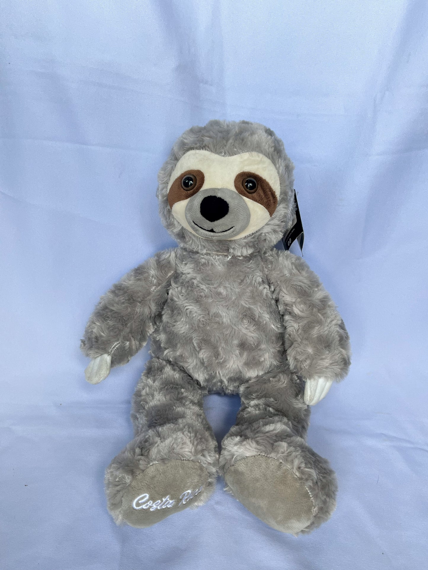 Perezoso peluche gris