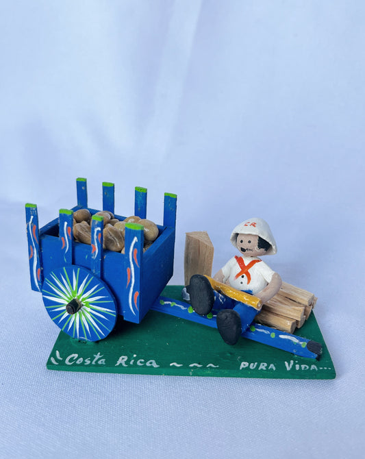Carretas azul con muñecos y café