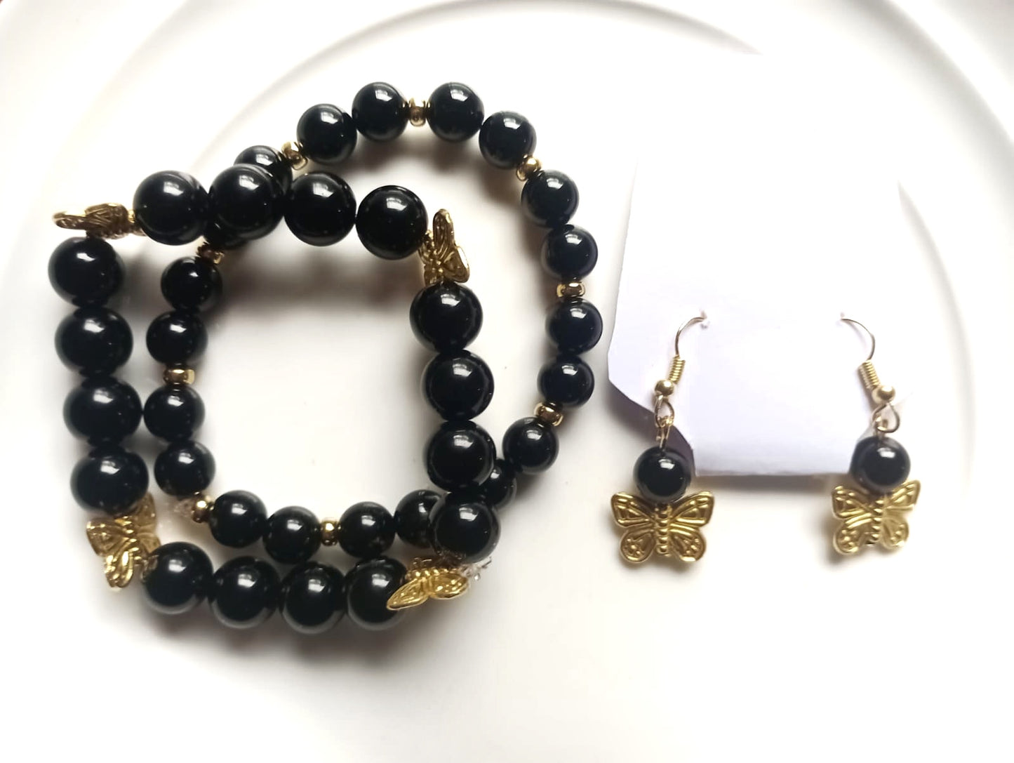 Juego de aretes y pulseras es en obsidiana y hematita