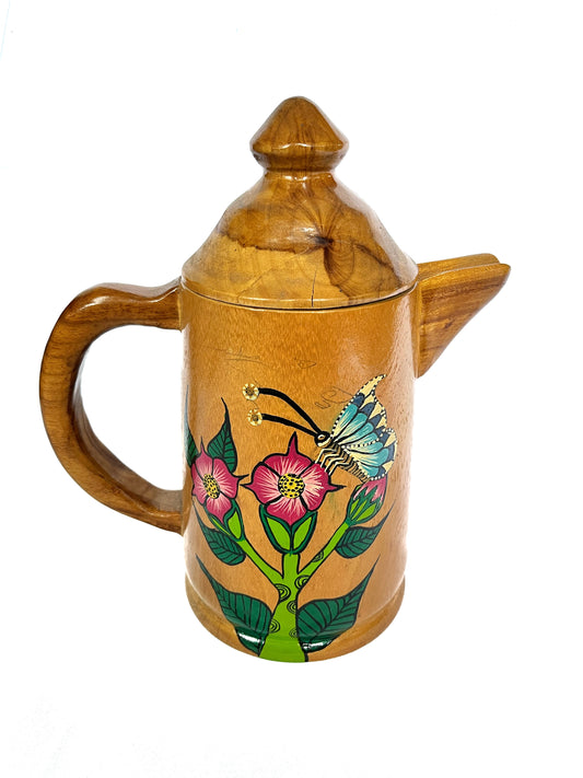 Pichel de madera mariposa y flores